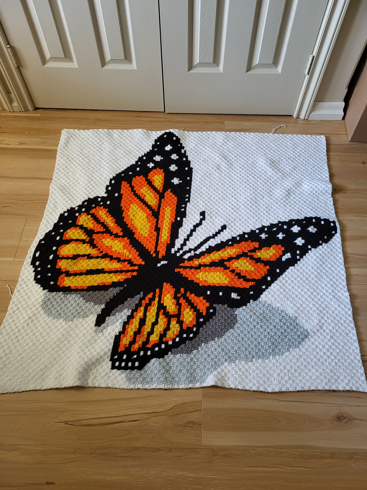 C2C butterfly crochet pattern for nature lovers, spring decor, handmade gifts, and colorful crochet blankets.
Monarch butterfly crochet graph pattern with orange, black, white, and grey details for a beautiful handmade blanket.