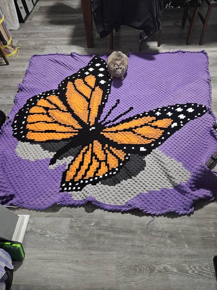 Monarch butterfly crochet graph pattern with orange, black, white, and grey details for a beautiful handmade blanket.
Corner-to-corner monarch butterfly blanket pattern with realistic wing markings and instant-download PDF instructions.