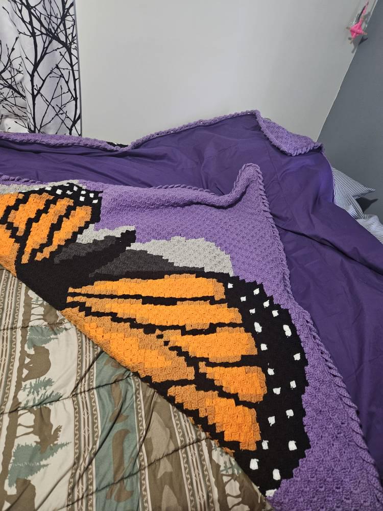 Crochet butterfly graphgan pattern showing a detailed monarch butterfly with orange wings, black outline, and white wing spots.
C2C butterfly crochet pattern for nature lovers, spring decor, handmade gifts, and colorful crochet blankets.