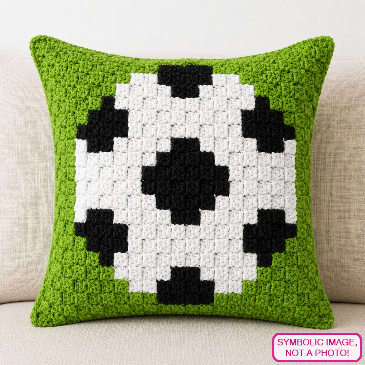 C2C crochet pillow pattern with written instructions featuring a black and white soccer ball graph design for sports fans and handmade gifts.