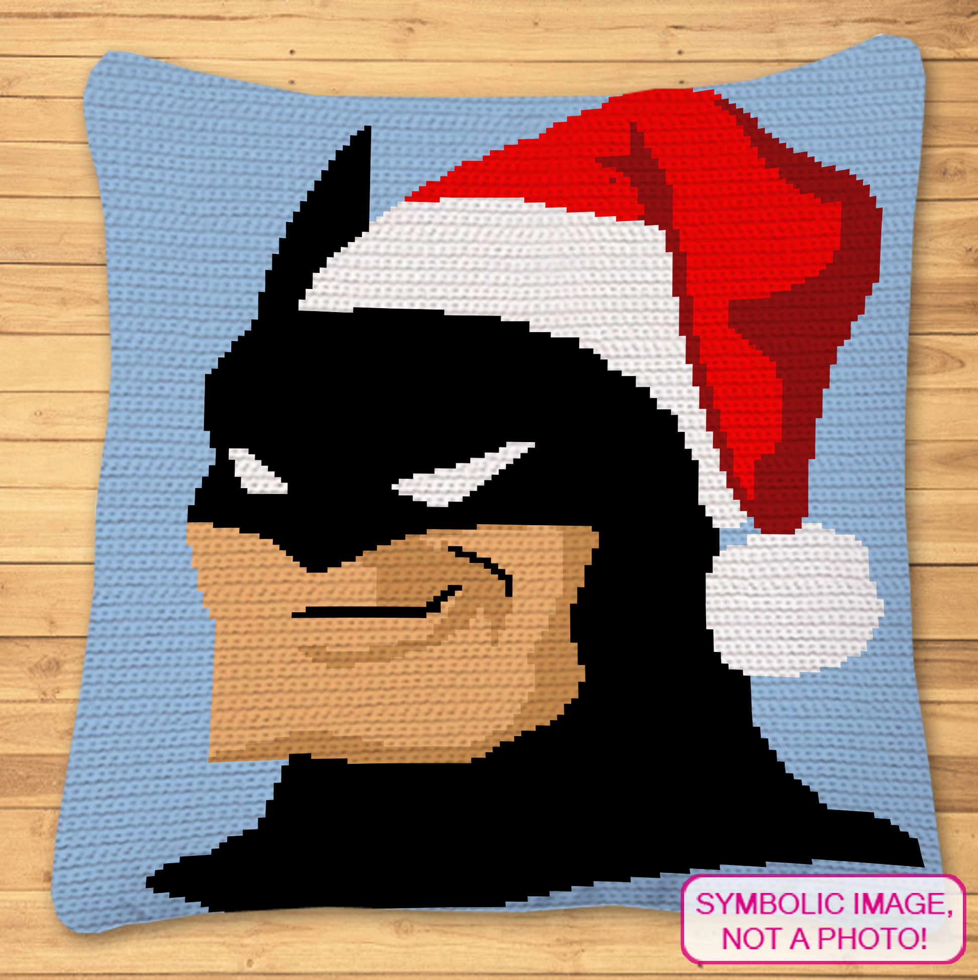 Christmas Batman tapestry crochet blanket and pillow pattern featuring a superhero portrait wearing a red Santa hat.
Single crochet superhero Christmas graphgan pattern with a 120 x 150 color chart and written row-by-row instructions.