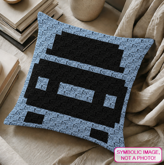 C2C crochet pillow pattern with written instructions featuring a cute car graph design for a quick handmade gift.