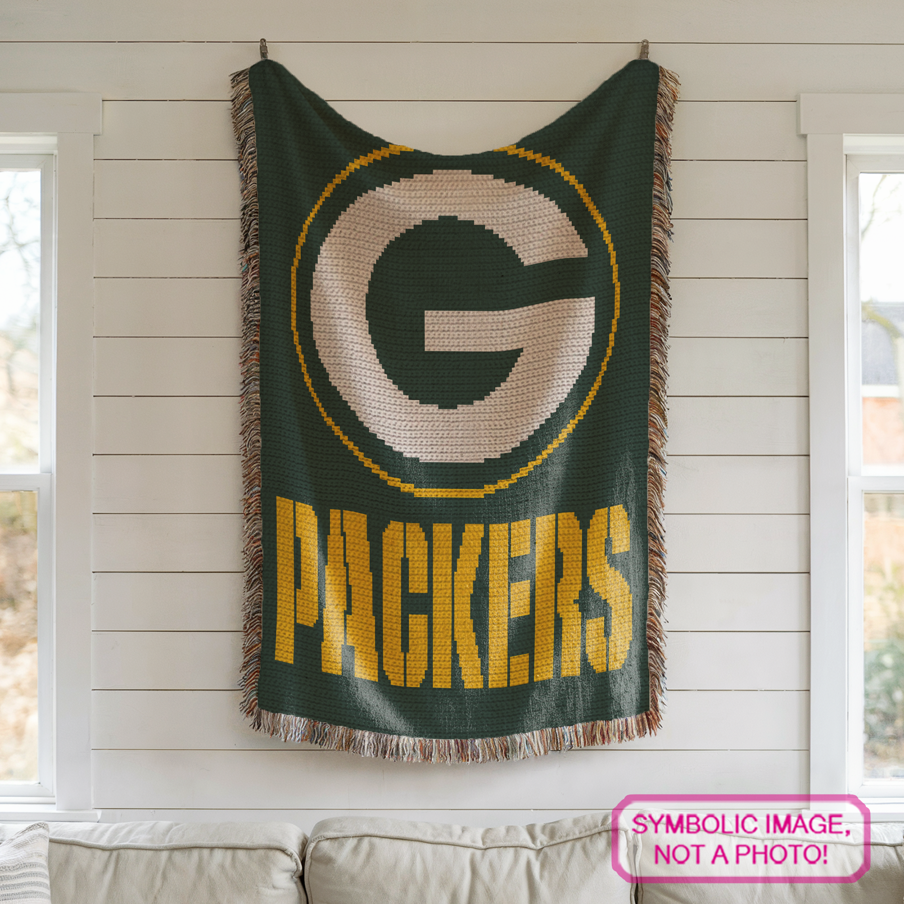 Tapestry crochet sports blanket pattern for football season, game rooms, bedrooms, and fan cave decor.
Football crochet graph pattern with bold Packers-inspired design, three colors, and written instructions.
