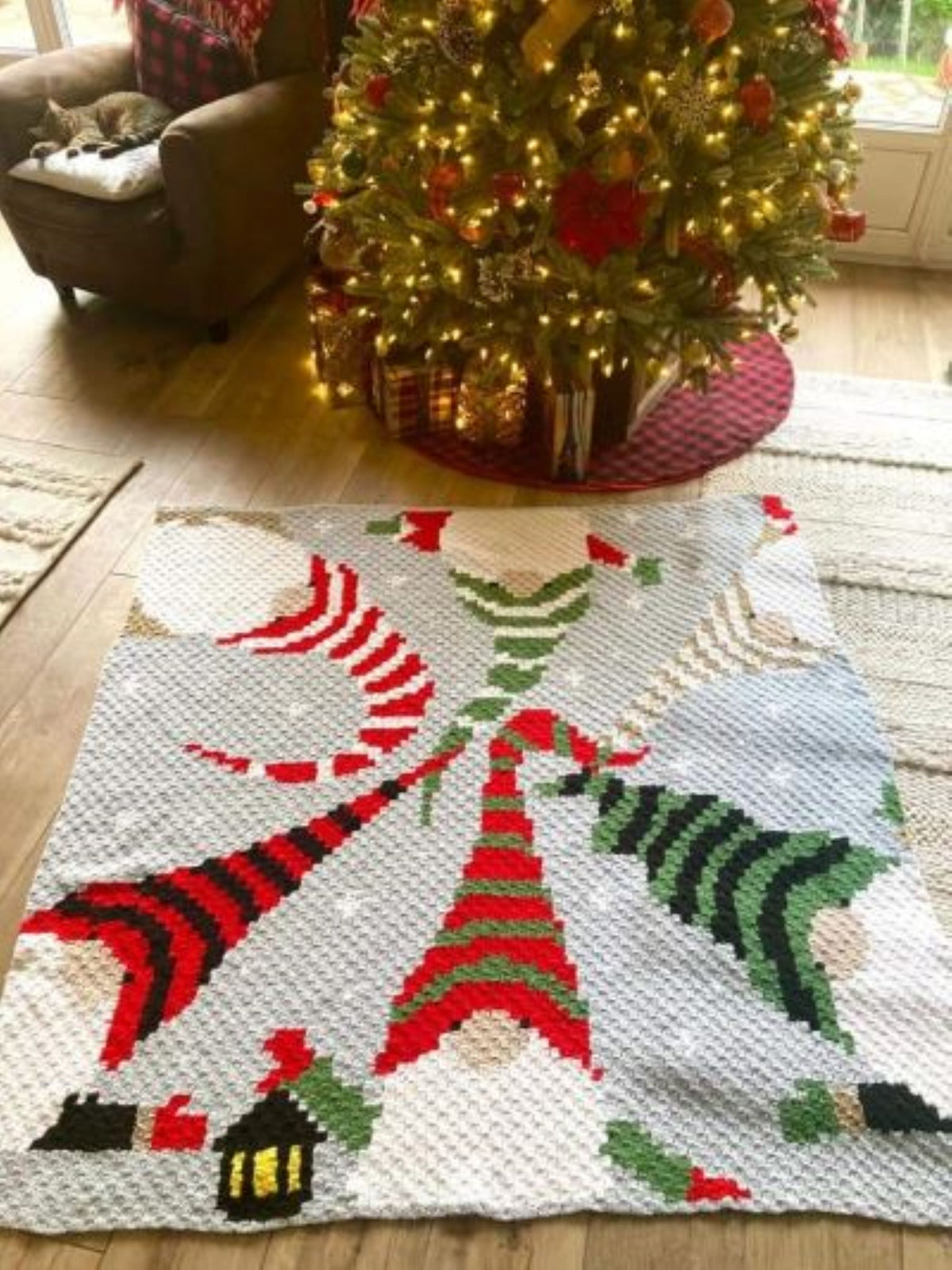 Cute Christmas gnome crochet blanket pattern with full C2C chart and row-by-row written instructions.
Holiday C2C graph pattern featuring playful gnomes, snowflakes, and bright Christmas colors.