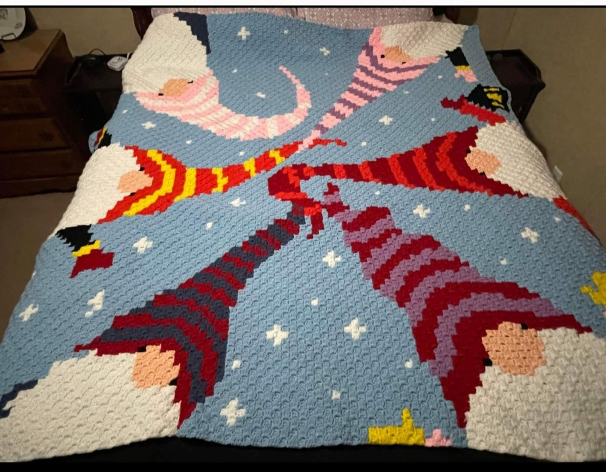 Gnome Christmas blanket crochet pattern with colorful hats, snowy background, and graphgan instructions.
Corner-to-corner Christmas gnome graphgan pattern for cozy winter blankets and seasonal crochet projects.