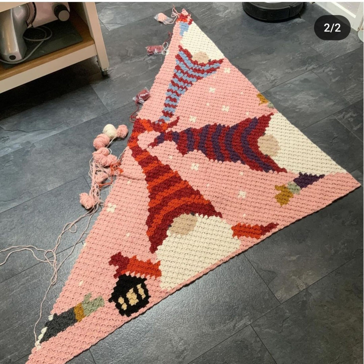 Whimsical Christmas crochet pattern featuring multiple gnomes, snowflakes, and holiday accents.
C2C Christmas Gnomes blanket pattern with written instructions, color chart, and instant-download PDF.