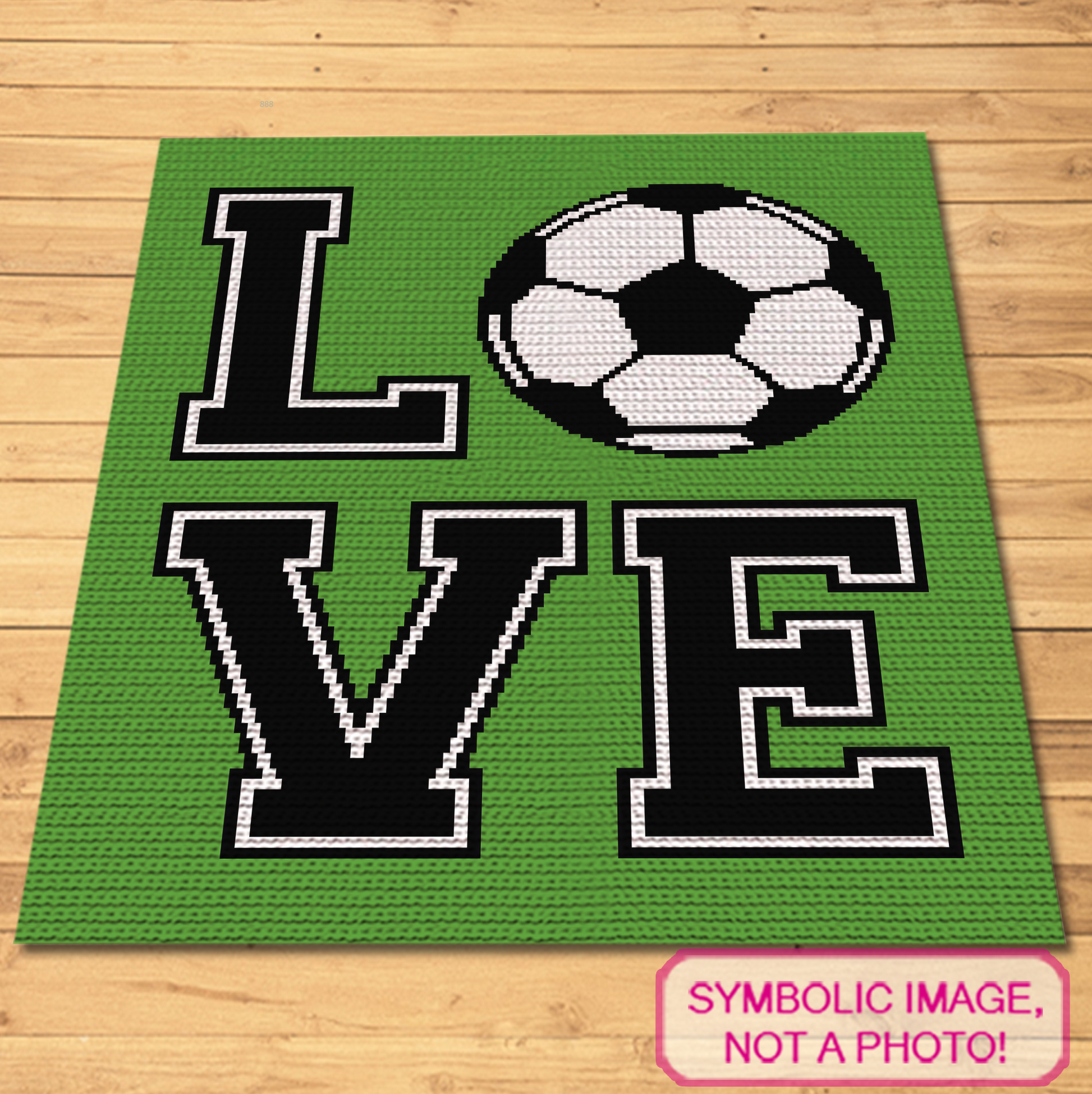 Love Soccer SC crochet blanket pattern featuring bold LOVE lettering and a black and white soccer ball graph design.