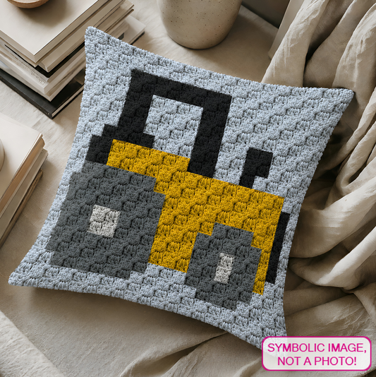 C2C crochet pillow pattern with written instructions featuring a yellow tractor graph design for farm nursery decor and handmade gifts.