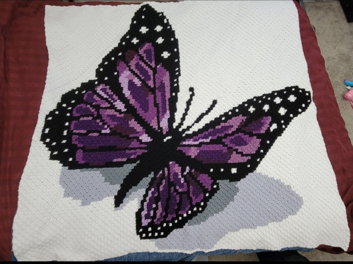 SC and C2C Monarch Butterfly crochet bundle with full-color charts and row-by-row instructions.
Crochet butterfly pattern bundle showing a detailed monarch butterfly with orange and black wings.