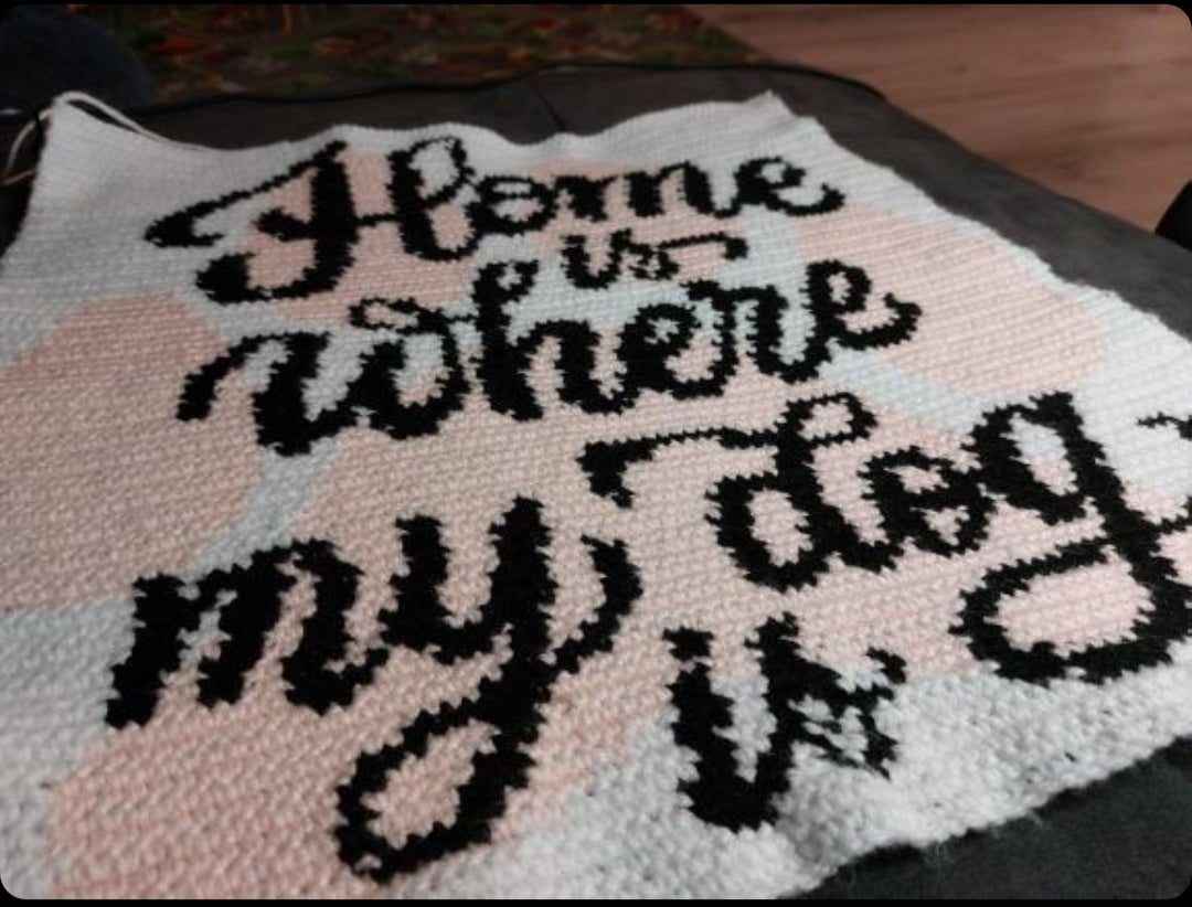 Home Is Where My Dog Is crochet graphgan pattern for handmade dog lover gifts and cozy home decor.
Tapestry crochet blanket pattern featuring yellow paw prints and meaningful dog quote lettering.