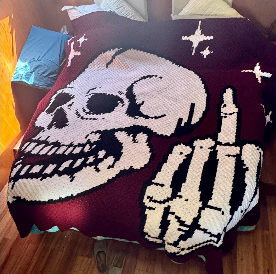 Add a bold, cheeky touch to your crochet collection with this Middle Finger Skeleton C2C Crochet Pattern. The design features a detailed skull with a raised middle finger and small star accents, making it perfect for funny adult crochet projects, gothic decor, Halloween makes, rebellious gifts, and statement blankets.