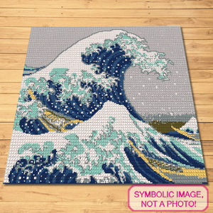 Create your own textile rendition of Hokusai’s famed woodblock print with this SC (Single Crochet) Crochet Blanket Pattern.

This design captures the majestic and powerful motion of "The Great Wave off Kanagawa", offering an intricate challenge to crochet aficionados.

Not only does this pattern allow for a striking visual piece to emerge from your handiwork, but it also brings an iconic piece of Japanese art into your living space, stitch by spectacular stitch.
Click for more!