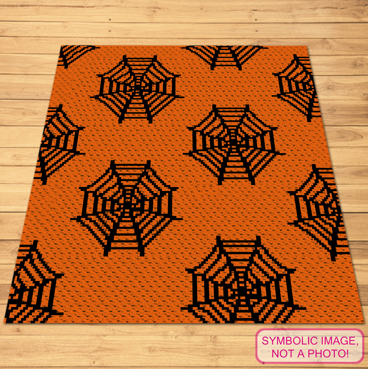 Orange and black spider web C2C crochet blanket pattern shown as a finished blanket mockup