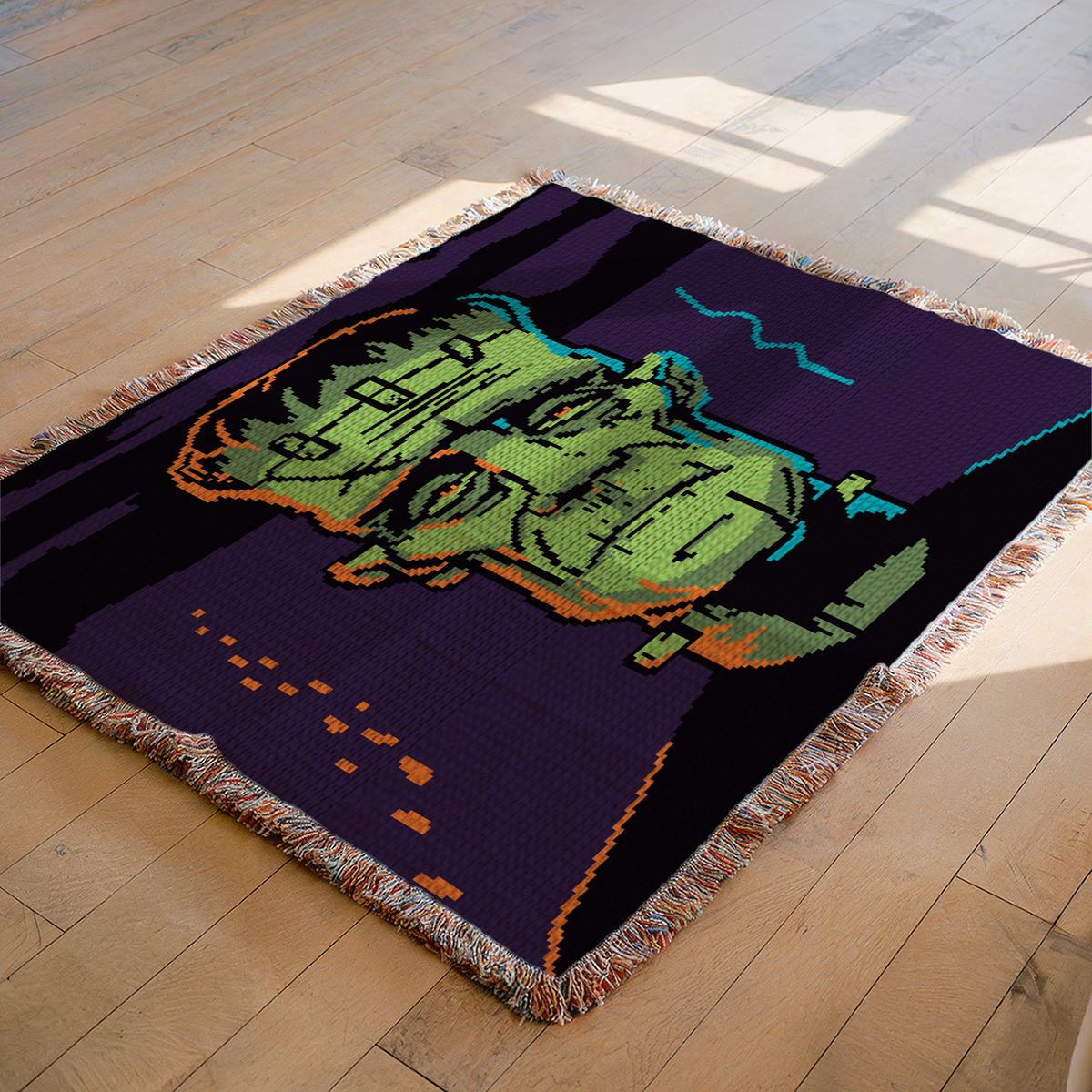 Halloween Frankenstein monster crochet blanket mockup shown on a floor with detailed green face and dark violet background.