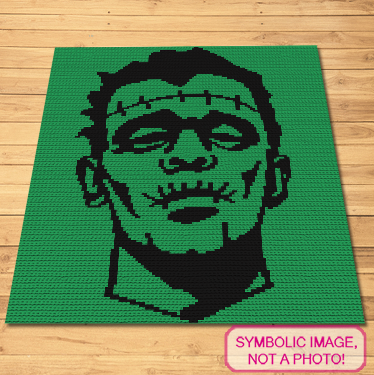 Frankenstein monster single crochet blanket pattern in green and black shown as a symbolic finished blanket image.