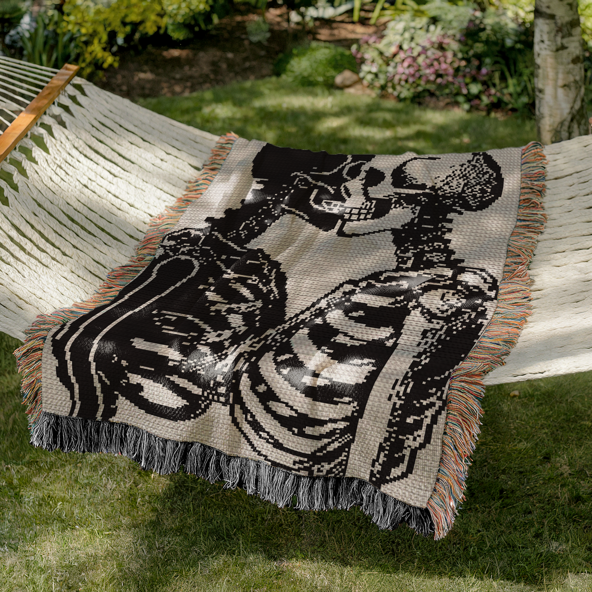 Goth skeleton couple crochet blanket pattern styled outdoors in a hammock