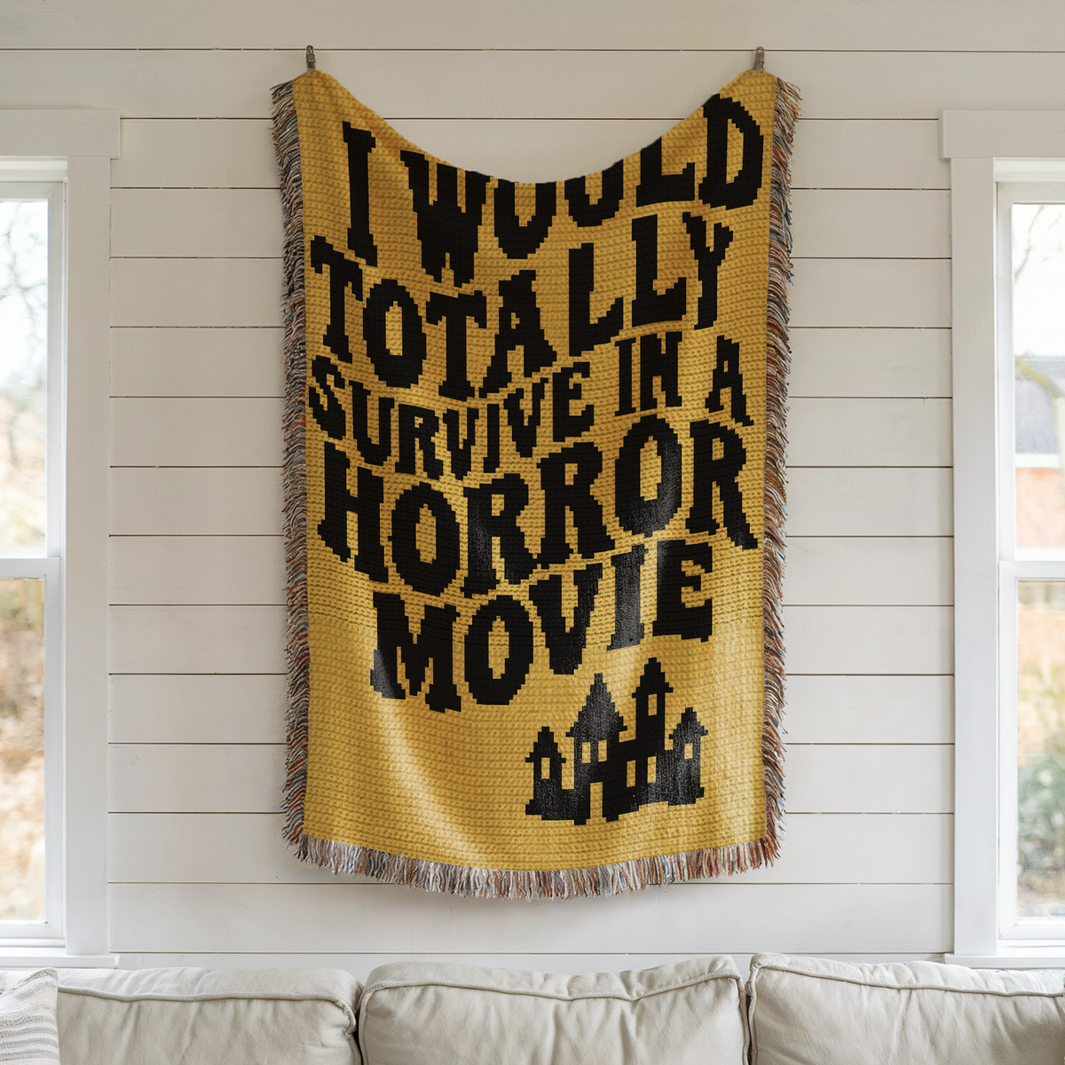Funny Horror Movie crochet blanket pattern in black and yellow with haunted house design