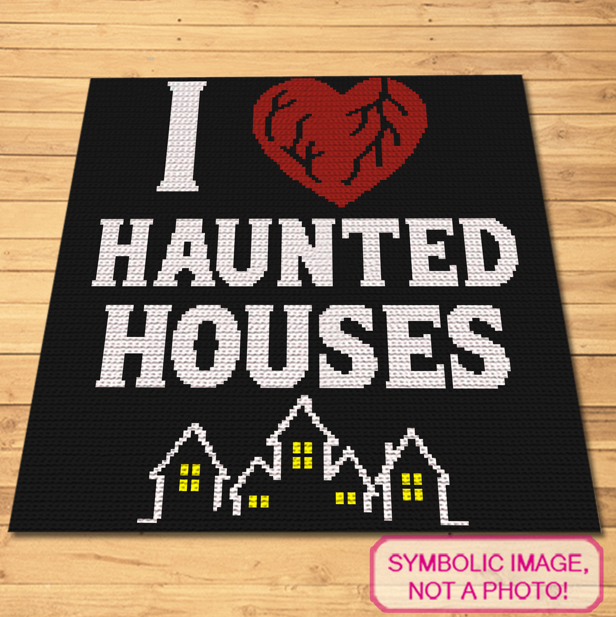 I Heart Haunted Houses SC crochet blanket pattern mockup featuring a red heart, white lettering, and haunted houses on black.