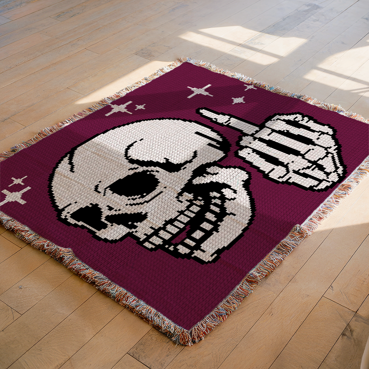 Middle Finger Skeleton C2C crochet blanket mockup on wooden floor with burgundy background