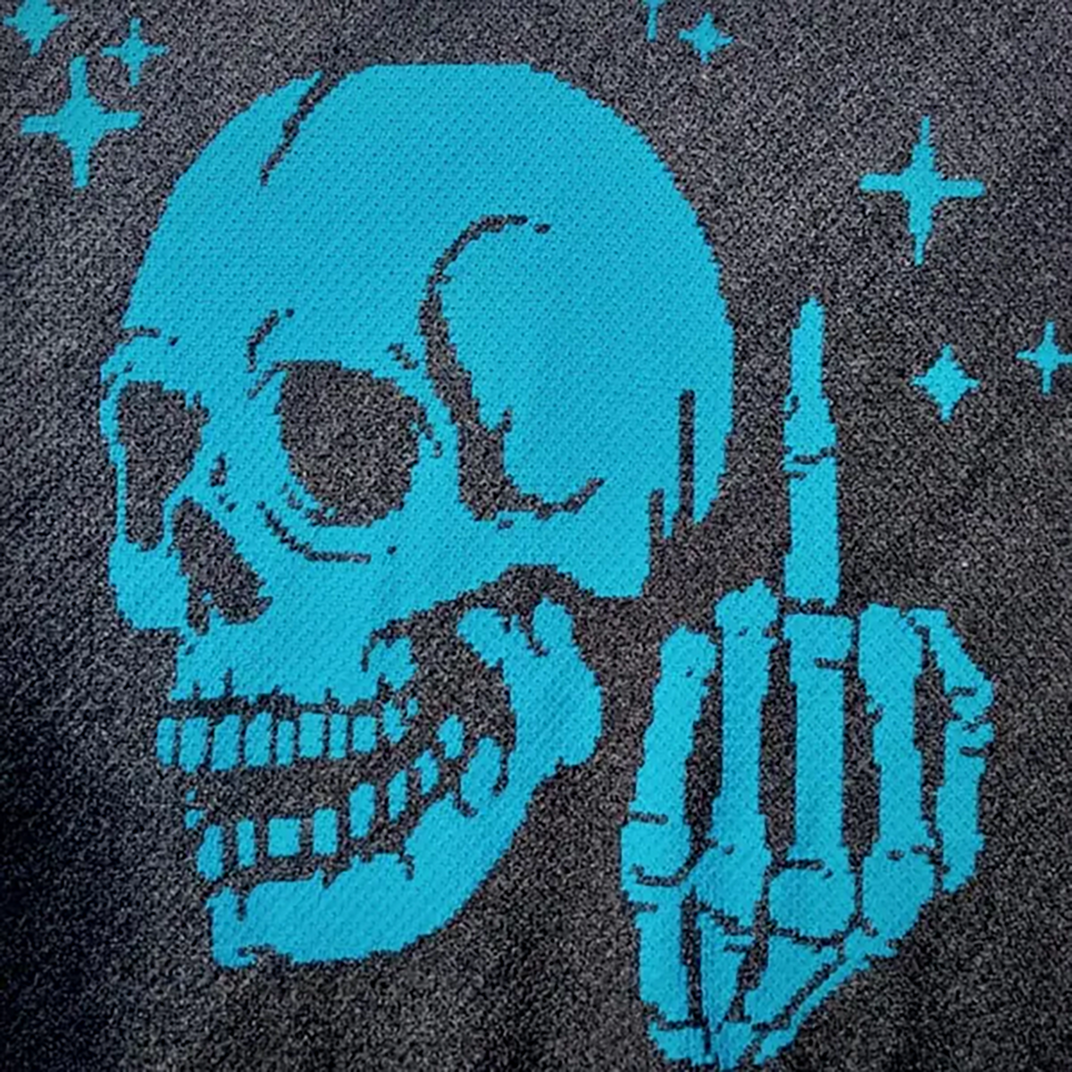 Finished Middle Finger Skeleton C2C crochet blanket in turquoise and black