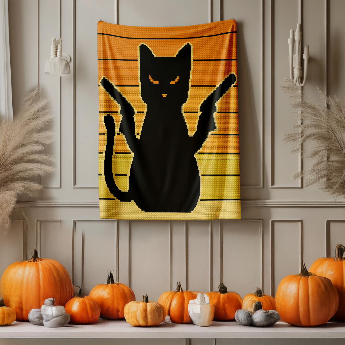 Pew Pew Cat black cat graphgan blanket displayed as wall decor in a Halloween room with pumpkins.
