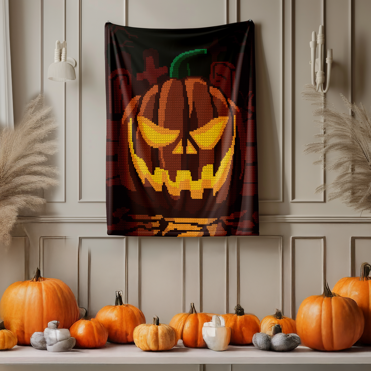 Pumpkin on a Graveyard C2C crochet blanket wall display with glowing jack-o-lantern and graveyard background.