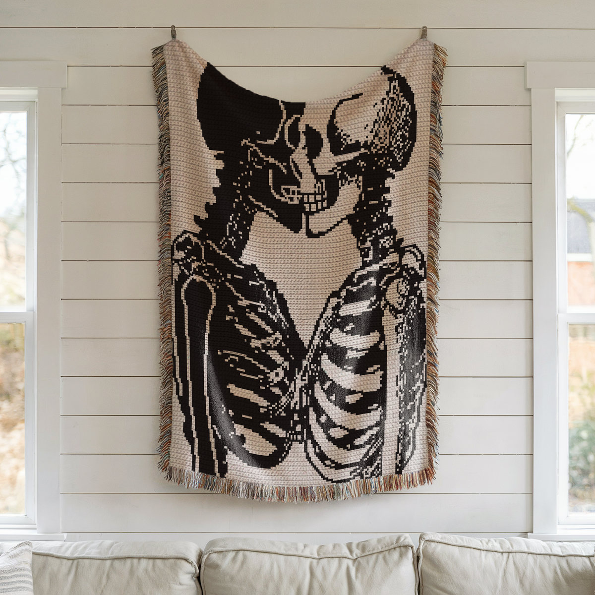 Gothic skeleton couple single crochet blanket pattern hanging as black and white wall decor