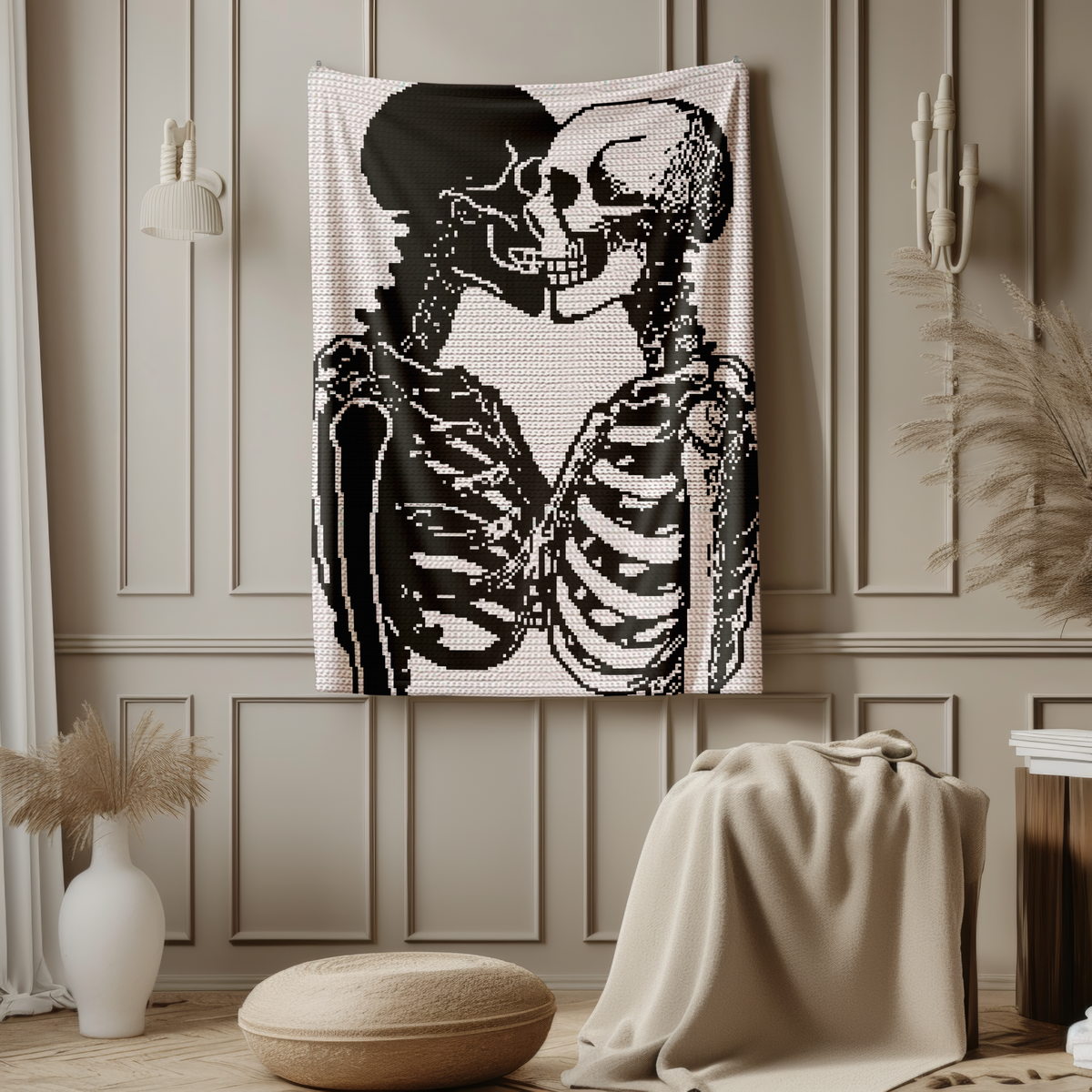 Skeleton couple tapestry crochet blanket pattern hanging in a neutral room