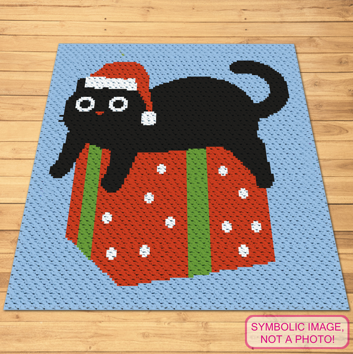 Xmas black cat C2C crochet pattern with a funny Santa cat sitting on a Christmas present