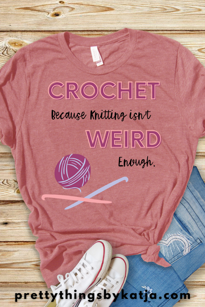Crochet because Knitting isn't weird enough is a Jersey Short Sleeve Tee. This Funny Yarn Shirt is a perfect Gift for a Crafty Woman. This classic unisex jersey short sleeve tee fits like a well-loved favorite. Soft cotton and quality print make users fall in love with it over and over again. Click to learn more!