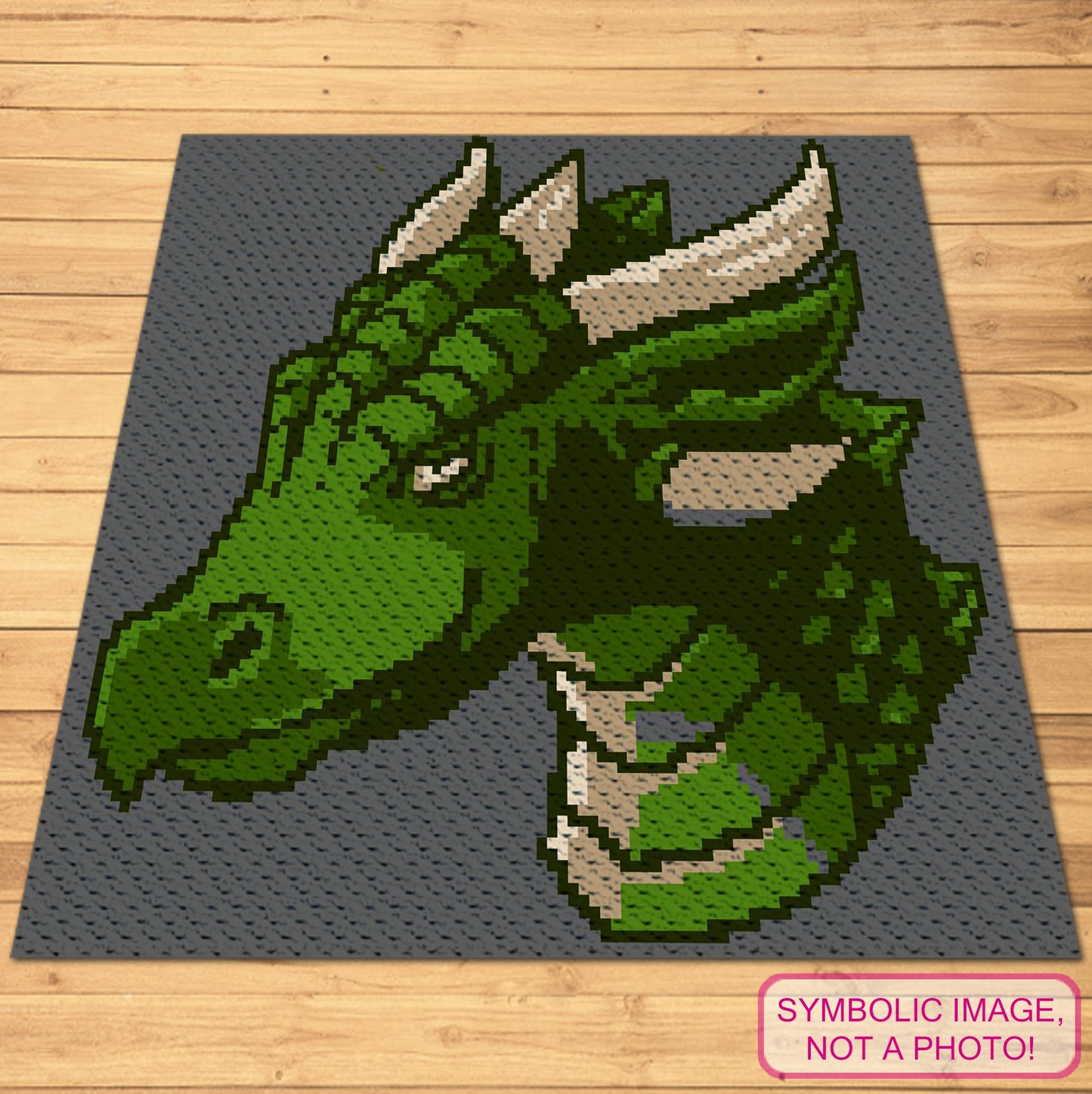 Dragon C2C crochet blanket pattern featuring a green fantasy dragon head graph design with written instructions.

C2C fantasy dragon graphgan pattern with full-color chart and written row-by-row instructions.
